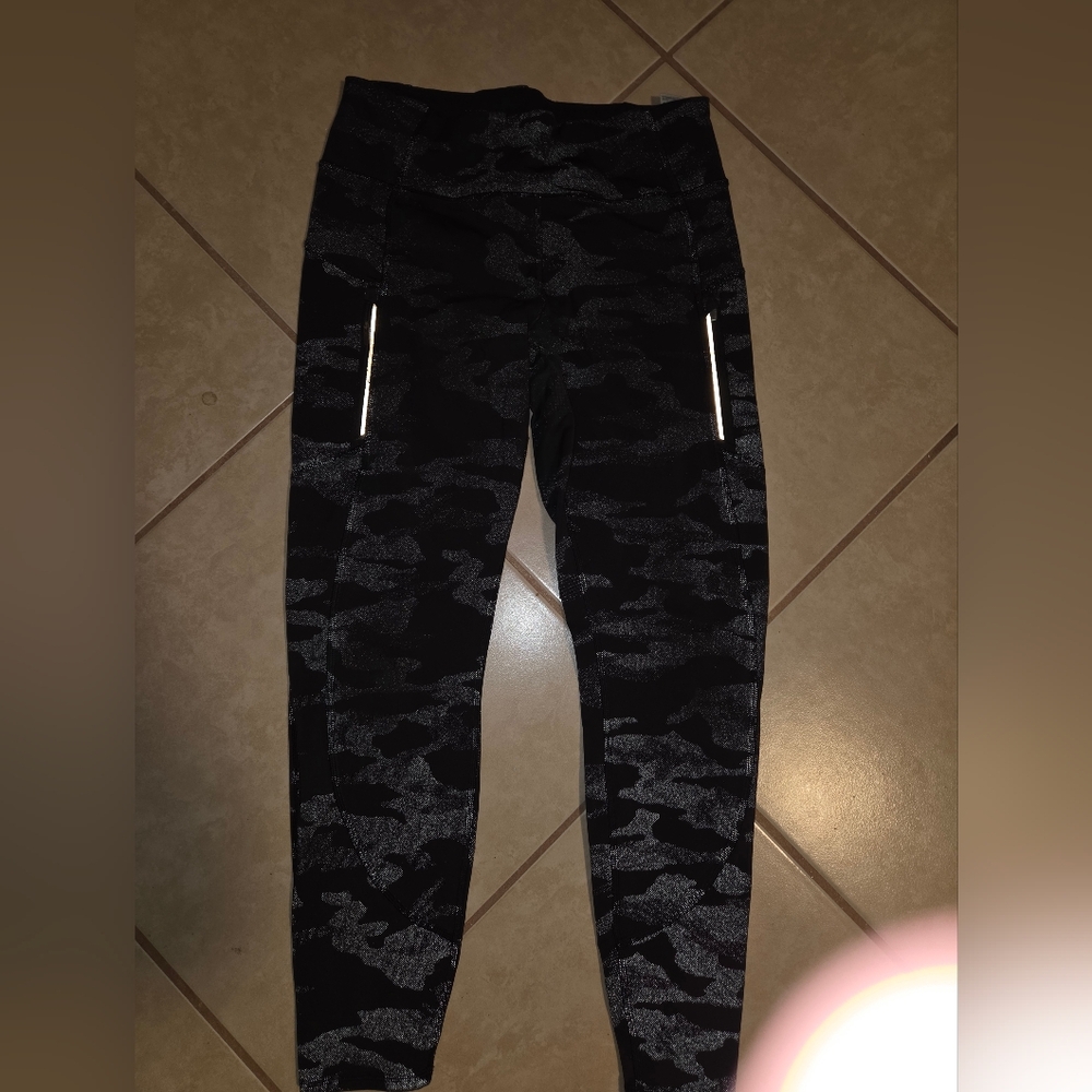 Athleta Black Camo Leggings with Reflective Pocket Accents